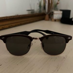 Club style sunglasses with brown lenses and wooden style arms